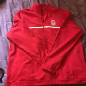 Red Nike golf shirt